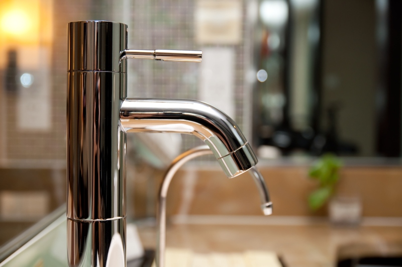 Leaking tap being repaired in Thornton Heath